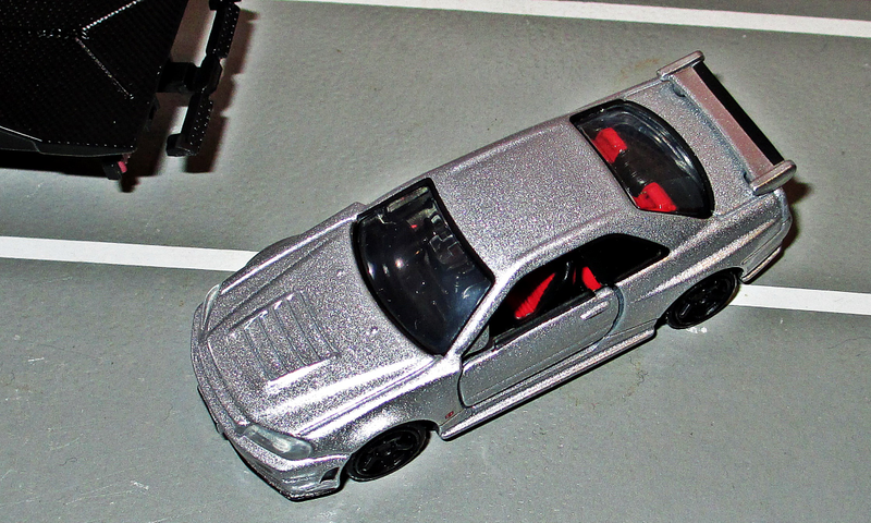 Illustration for article titled Land of the Rising Sun-Day: New Tomica Premium Skyline, RX7 and Morita